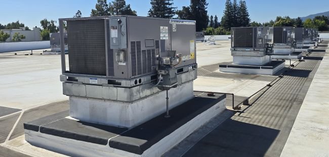 Commercial rooftop HVAC units on a flat building in Sacramento, California